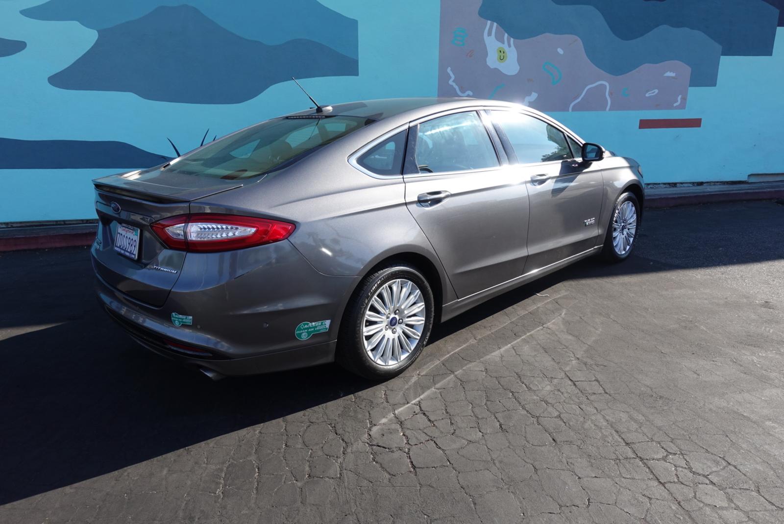 Ford Fusion Energi side view premium hybrid sedan Santa Cruz Capitola car rental
