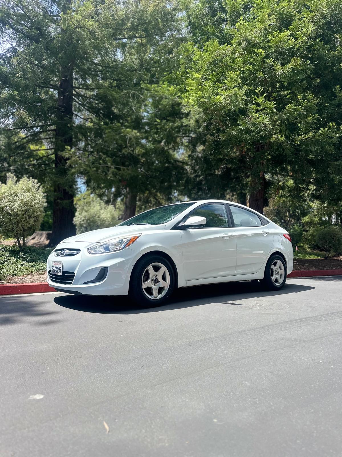 Hyundai Accent side profile efficient city car Santa Cruz Capitola