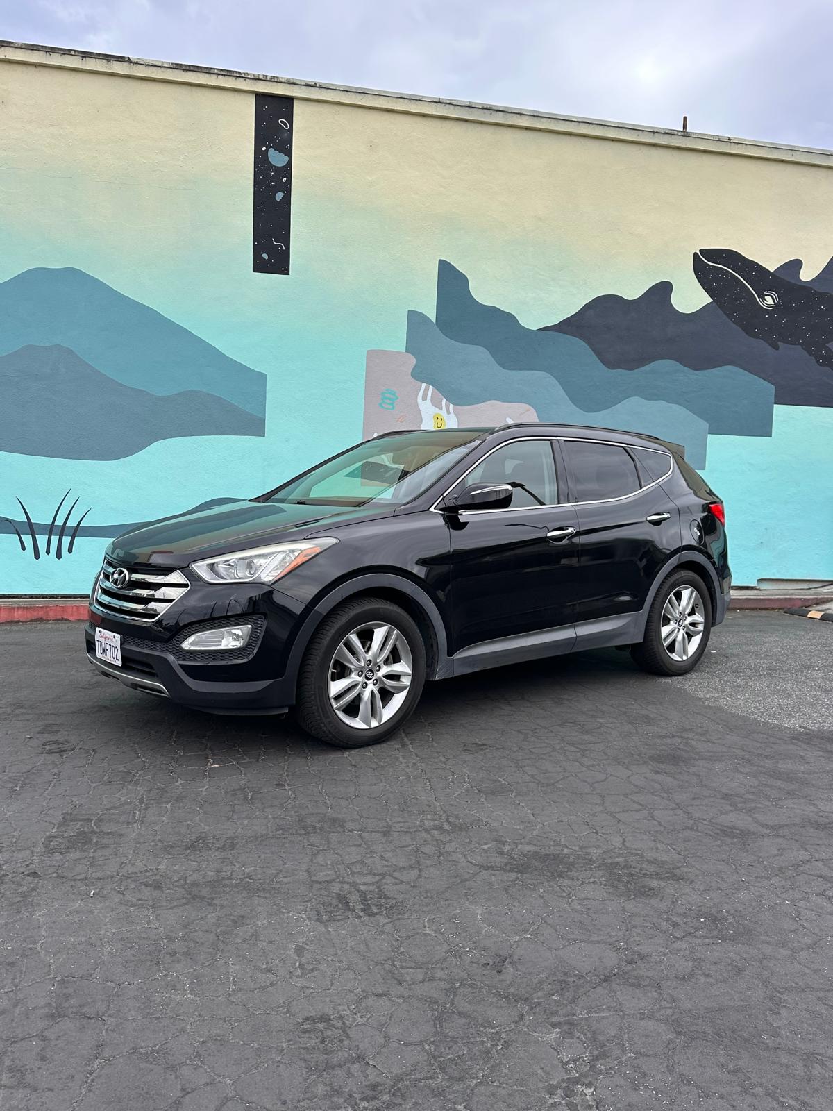 Hyundai Santa Fe Sport side profile family SUV Santa Cruz Bay Area road trips
