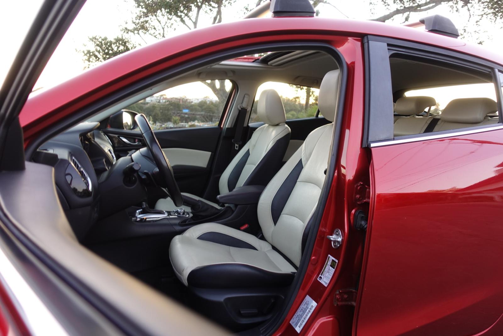 Mazda 3 rear view sleek hatchback rental Santa Cruz city car Capitola