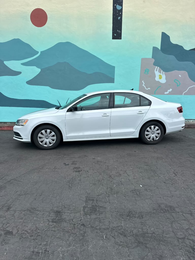 Volkswagen Jetta side view refined sedan Santa Cruz airport transfer Capitola